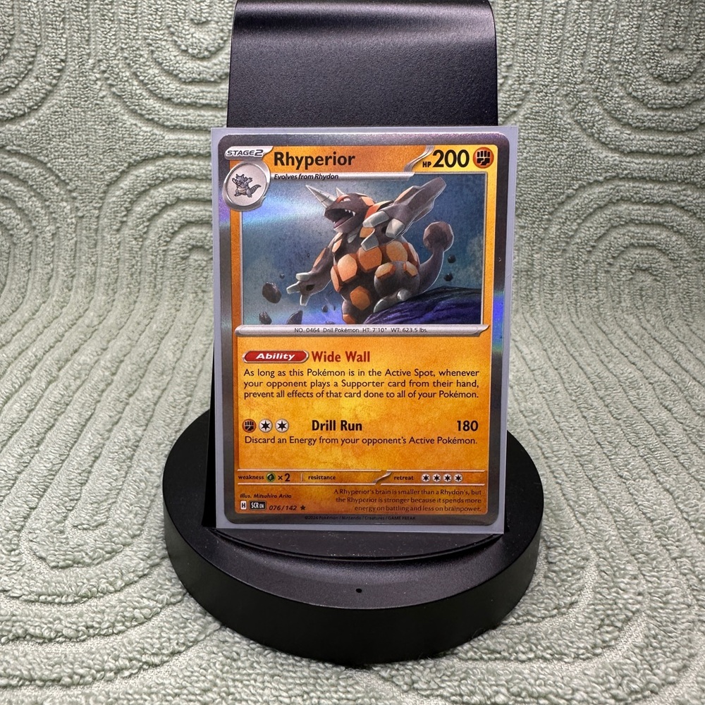 Rhyperior Pokémon Card with Orange and Gray Design holo